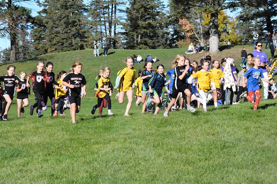 Eight-year-old girls set out for their Williams Lake school cross-country race held Friday, Oct. 11 in Boitanio Park. 