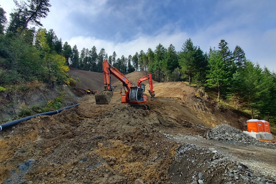 Crews work on site of the Dog Creek Road slide Thursday, Sept. 26, 2024. 
