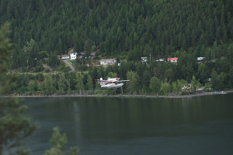 A Con Air Fire Boss lifts off of Williams Lake as a group of the air tankers flies in support of firefighting efforts in the area west of Williams Lake on Aug. 10.