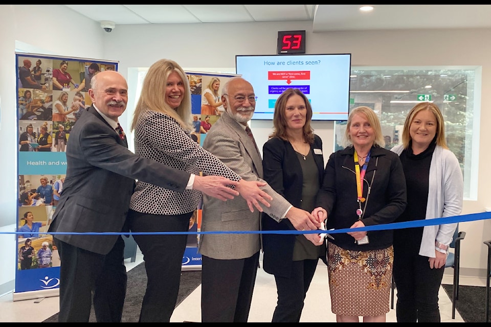 From left to right: Dr. Glenn Fedor, Karen Cooper, Mayor Surinderpal Rathor, Diane Shendruk, Michelle Murray and Kelly Dillon at the ribbon cutting for the new urgent and primary care centre in Williams Lake. 