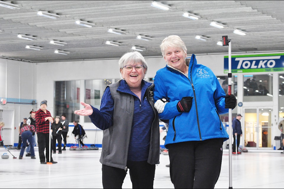 Sips Debbie Barker from 100 Mile and Donna Shiach from Williams lake at the 2025 Joint Bonspiel in Williams Lake. 