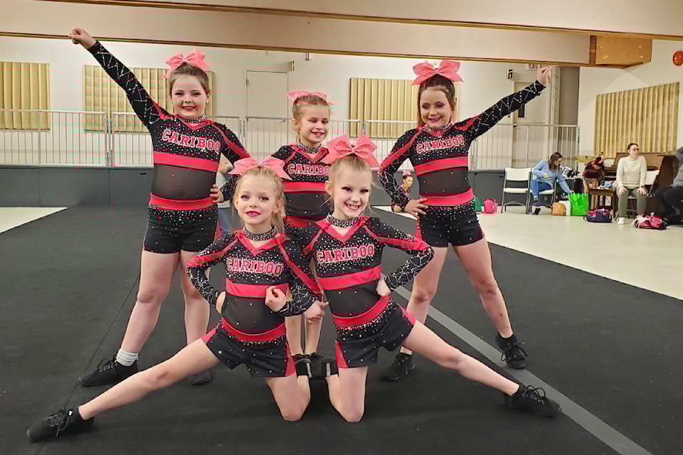 Cariboo Cheer All Stars Rory Talkio, left front, and Heather Nairn, Mackenzie Matuschewski, left back, Amélie Daly and Charlee Reid pose on Feb. 20, 2025, after practicing their routine for provincials. 