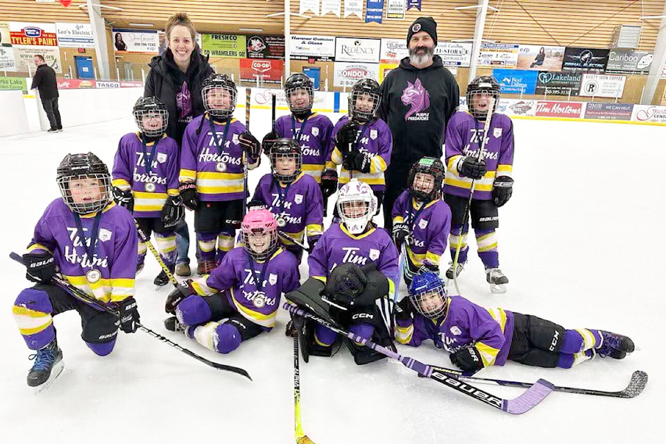 The Purple Predators U9 girls hockey team.