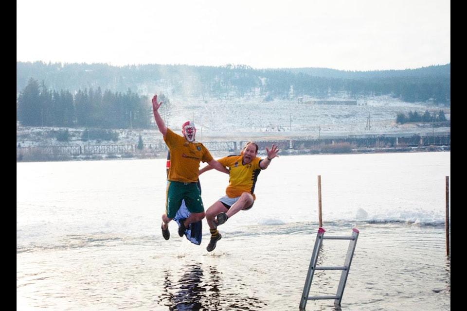 PJ Wells and Todd Pritchard at the Polar Bear Swim in 2013, an event which ran annually and proceeds went towards youth rugby programs in Williams Lake. 