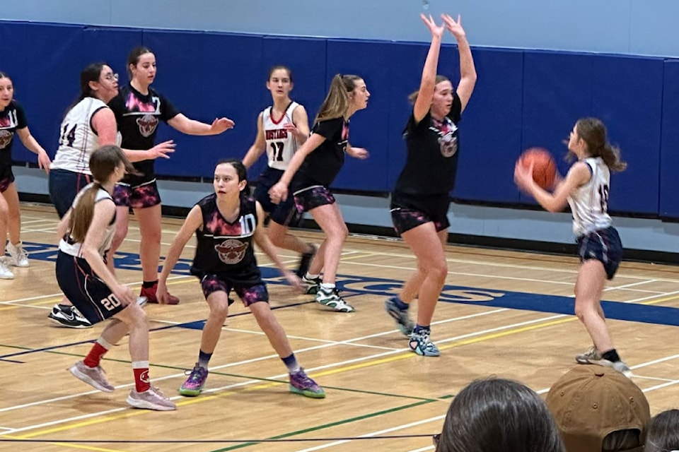 Columneetza Falcon Kelsey Camille closes out a shooter from the Hope Mustangs Friday, Jan. 24 at a game at Hope Secondary School. 