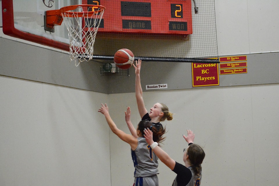 Lake City Secondary School Falcon Ainsley McKinnon goes in for a basket in a game against Barriere Saturday, Jan. 18 in Williams Lake. 