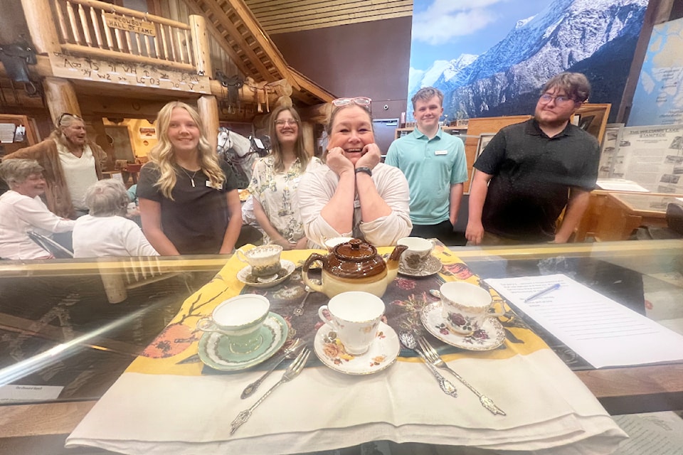 Juldy McLeod, volunteer coordinator at the Museum of the Cariboo Chilcotin, centre, with summer student staff. Aubreigh Gentles, from left, Hannah Caruso, McLeod, Evan Buchi, and Ryan Moeliker.