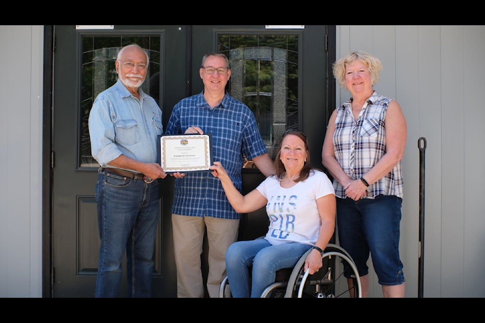Mayor Surinderpal Rathor, Pastor Trevor Hagan, Chair of the Accessibility Committee Maureen Straza and Debbie Skinner, society administrator for the Evangelical Free Church in Williams Lake.