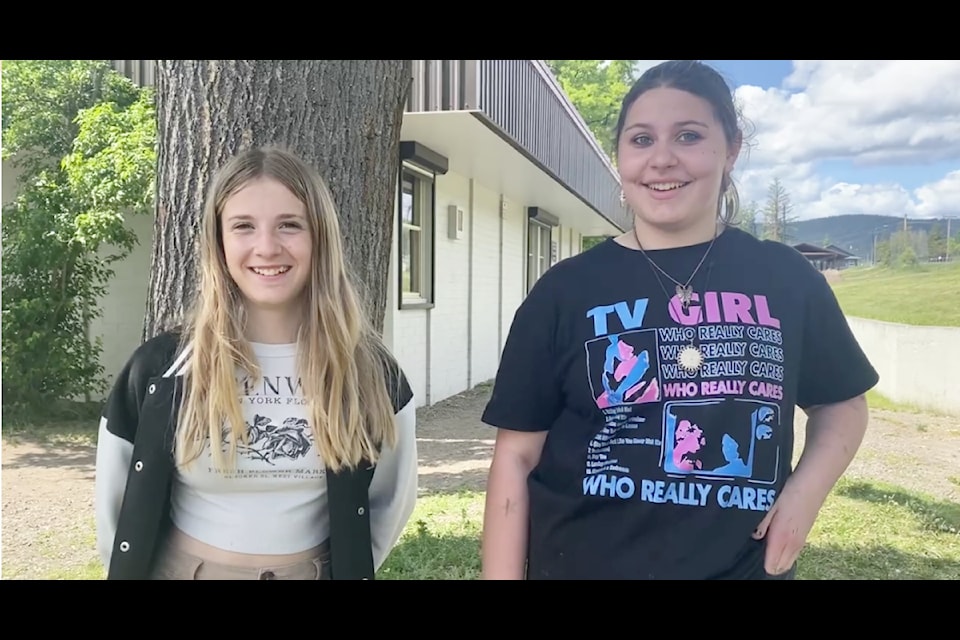Grade 7 French immersion students Mya Hill and Khloe Bremner run the 'pétanque' station, where students get to try a game similar to bocce ball. 