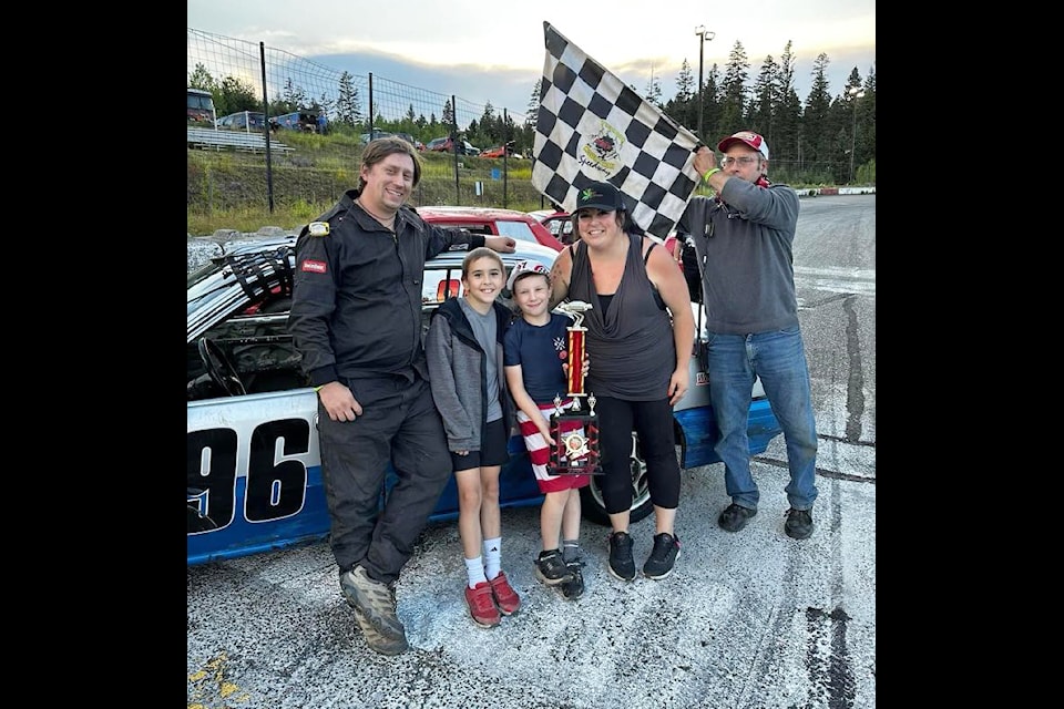 Cole Bird accepts a trophy at WL Forestry/Napa Thunder Mountain Speedway. 