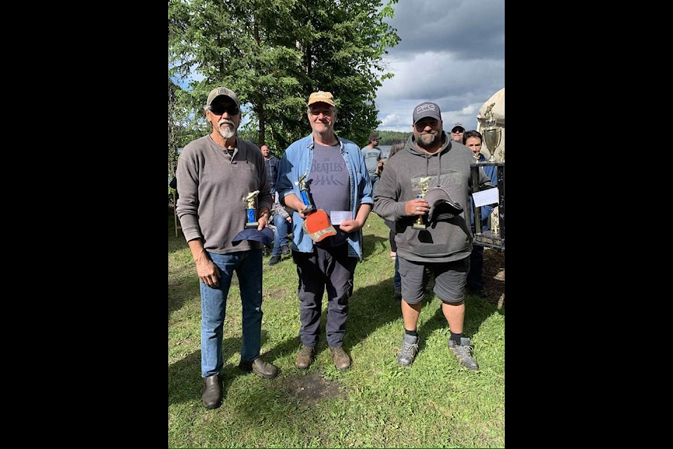 Gil Van Riel, left, Pat Griffin, centre, and Rick Dubreuil, right - to three winners in adult rainbow trout at the Big Lake Fishing Derby. 