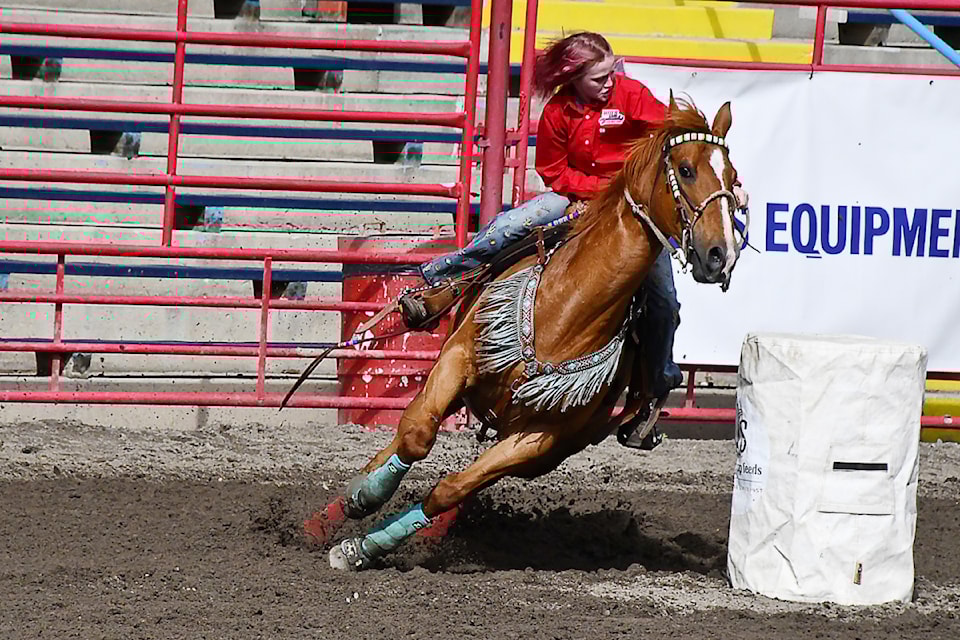 Ellie Hill of Williams Lake 'smoking around the barrels in the Senior girls division in the Sunday performance at the Little Britches Rodeo in Williams Lake Sunday, June 1.  Ellie proved to be untouchable as she won the barrel racing back to back (Saturday & Sunday), the only barrel to go under 16 seconds either day. This Sunday run through the barrel pattern clocked in at 15.663 seconds. Go Ellie go.
