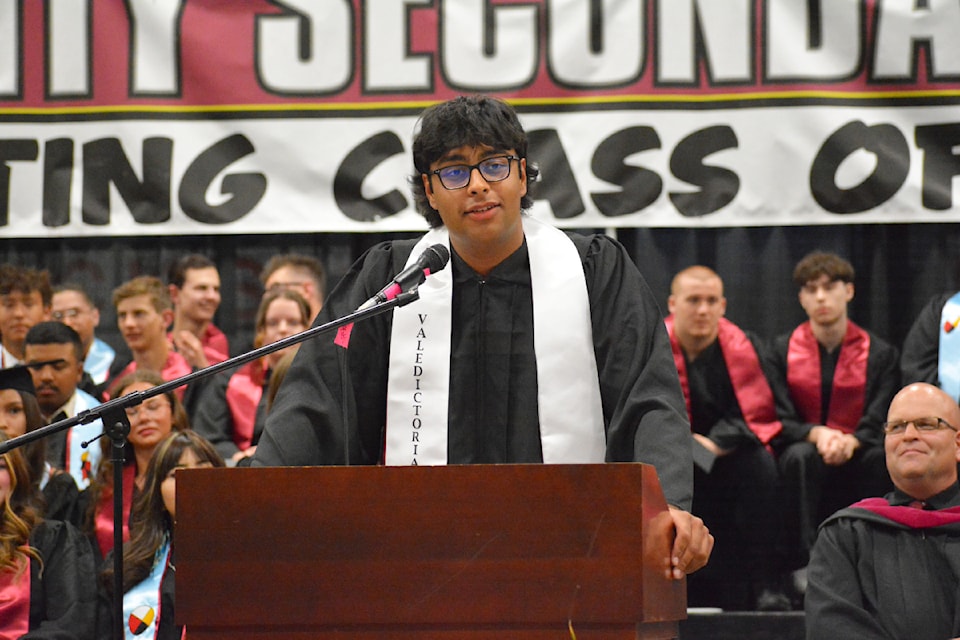 Arwin Klar gives the valedictorian address to the 2025 Williams Lake Secondary School graduation class during the grad ceremony Friday, June 13, 2025. 