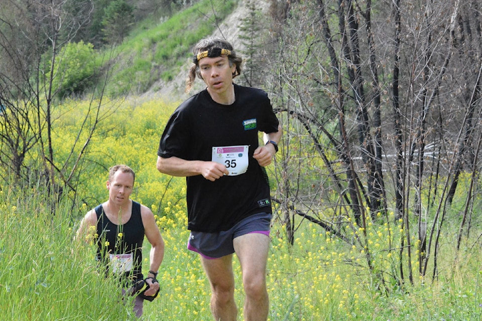 Avid runner Corey Roberts-Reynold leads at the beginning of the 15 km Westsyde Boogie Trail Run Saturday, June 14 in Williams Lake. 