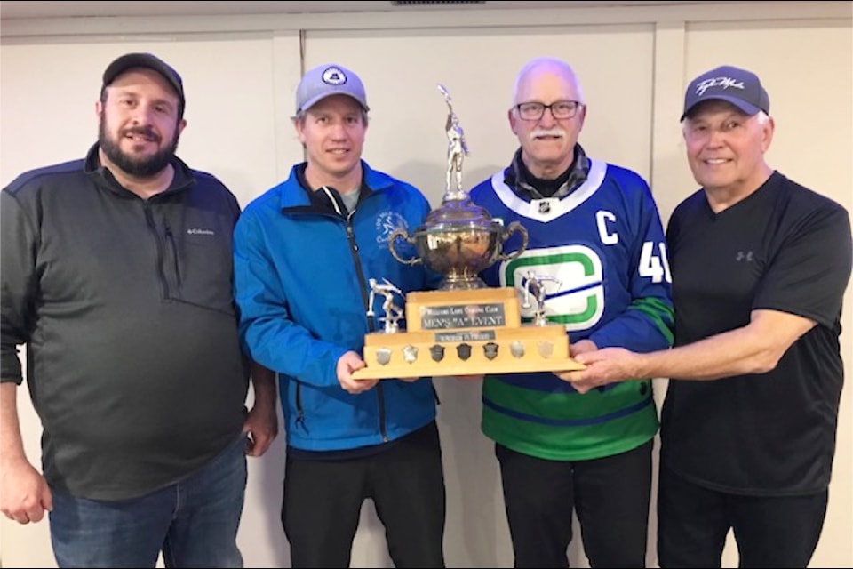 Ron Bisaro team members Ron Bisaro, skip, Marg Berg, third, Moe Monito, second, and Adam Cook, lead. take home the Williams Lake Men's A League trophy. 