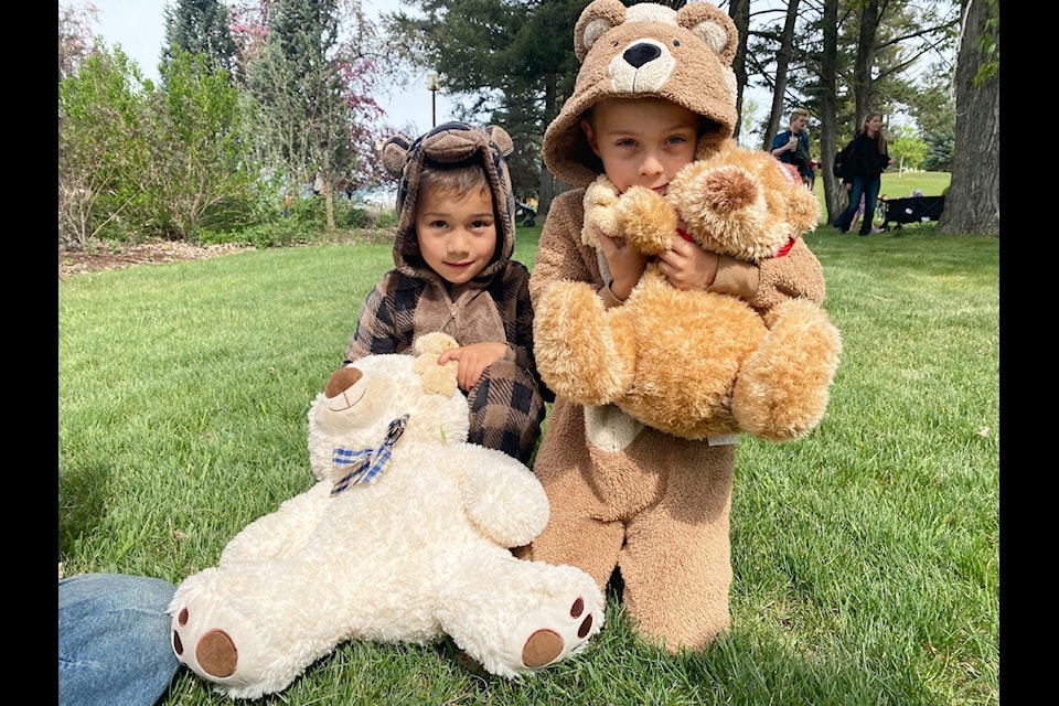 Caleb and Chance Bruneau marched in the Bear Witness Parade on May 9 wearing their own bear onesies. 