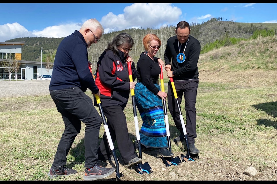 Robert Thibodeau, Lynn Gilbert, Linda Hillegeist and Kúkwpi7 Willie Sellars break ground at the site of the new child and family services building expected to open in Fall 2026. 