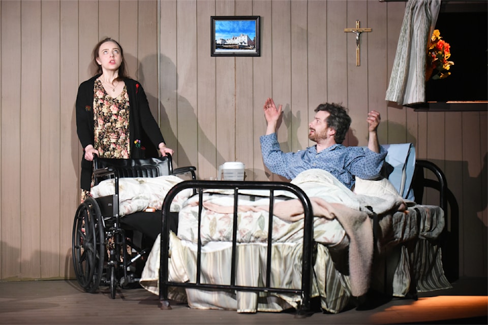Annie Wilkes, played by Jenny McPhee, and Paul Sheldon, played by Matt Tyne, make up two of the three-person cast in the Williams Lake Studio Theatre production of Misery.