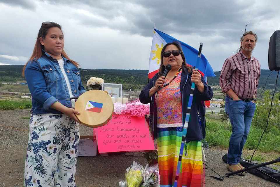 Shelly Herrera-Llanera and Esk'etemc elder Irene Johnson stand together Saturday, May 10, as the community gathers in Williams Lake to honour the victims of the Lapu-Lapu event tragedy in Vancouver. 