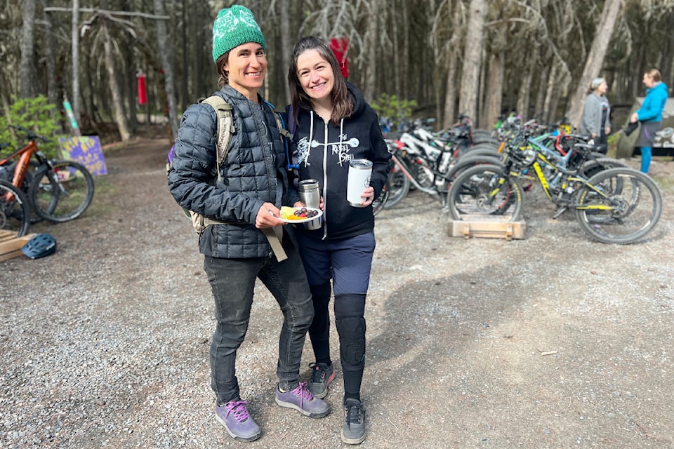 Jacinta D'Andrea and Leah Martin enjoy a morning hang at the Ride Your Ride mountain bike festival in Williams Lake.