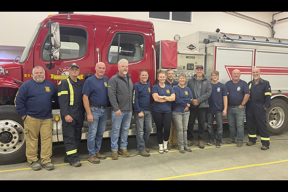 Big Lake Volunteer Fire and Rescue members Brian Devlin, Murray Dyment, John Benish, Mark Wilkie, Brad MacKendrick, Brittney Parker, Ken Waters, Virginia Waters, Richard Lucy, Ian Bruneski, Dan Swan and Eric Annett. Missing from the photo are
Scott Sollenberger, Lora Mears, Isabella Plasum and Kelly Burnham.