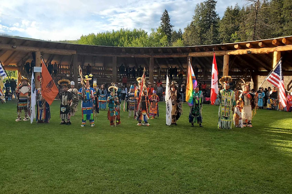 Dancers participate in the Grand Entry for the Williams Lake First Nation Father's Day Traditional Pow Wow Friday, June 14, 2024 at the Chief William Pow Wow Arbor. 