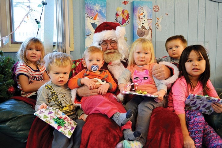 mly Sunshine and Smiles Daycare kids with Santa