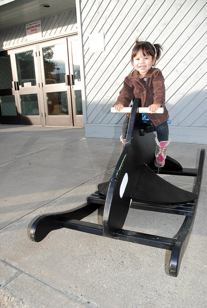 45836tribune-a18-DSC_0665-Gayce-Nickel-20-months-tries-out-her-orca-rocking-horse