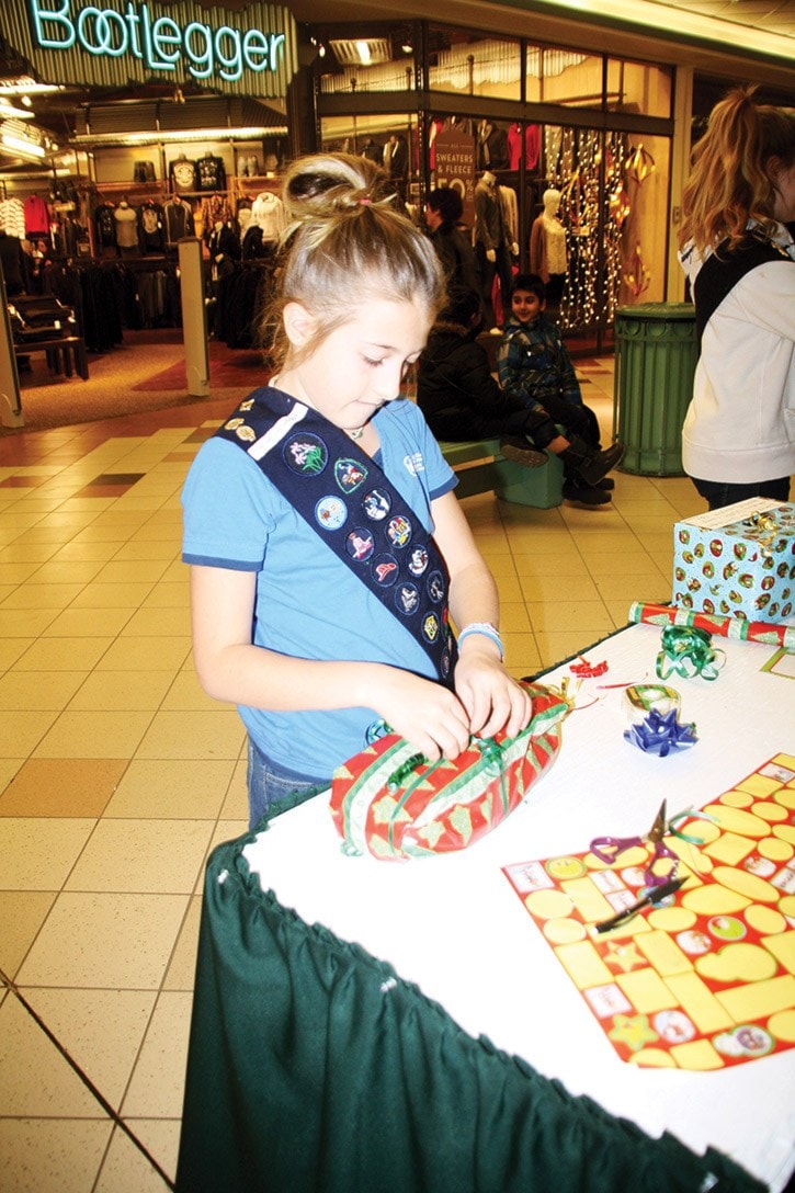 mly Girl Guide gift wrapping during Black Friday at the mall