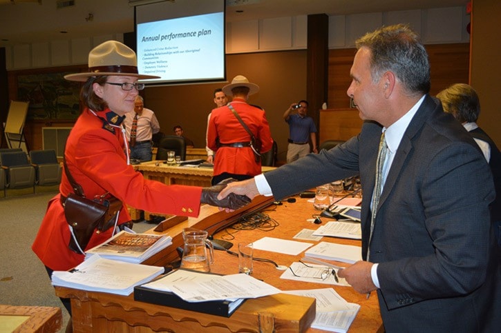 mly RCMP hand out tickets to regimental ball to city hall