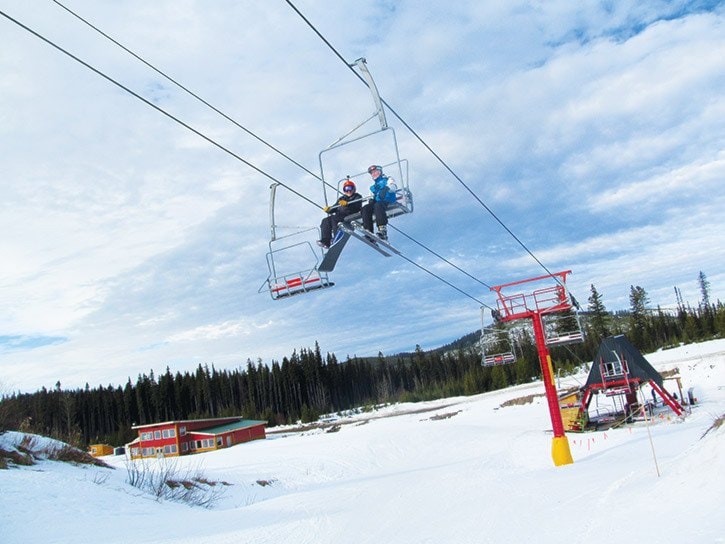 61722tribuneIMG_8151-Chris-Hornby-photo-Ed-Kozuki-and-George-Atamanenko-ride-the-lift-at-Mount-Timothy-Ski-Hill-Wednesday