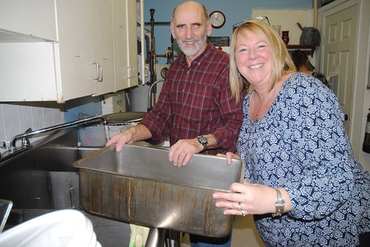 Empty Bowls helpers Ray Coupe and Caren Pritchard helped with the washing up.