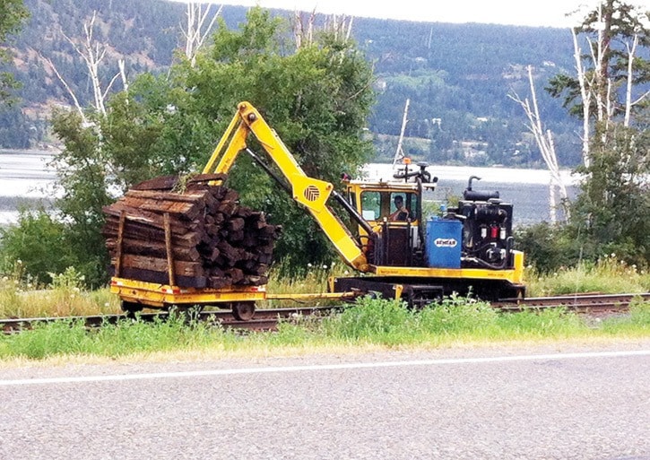 mly crews removing and replacing railway ties