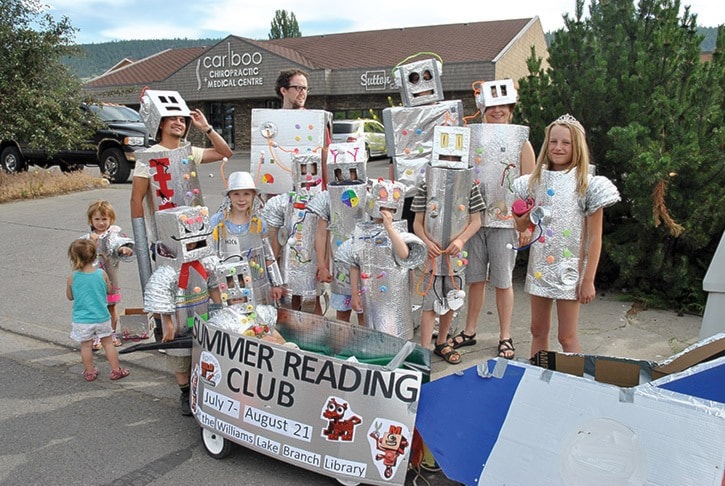 88214tribunegf-library-robots-in-parade-DSC_0620-Library-summer-reading-club-Aubrey-Silver-robot-cowgirl-and-Sienna-McCarvill-princess-robot