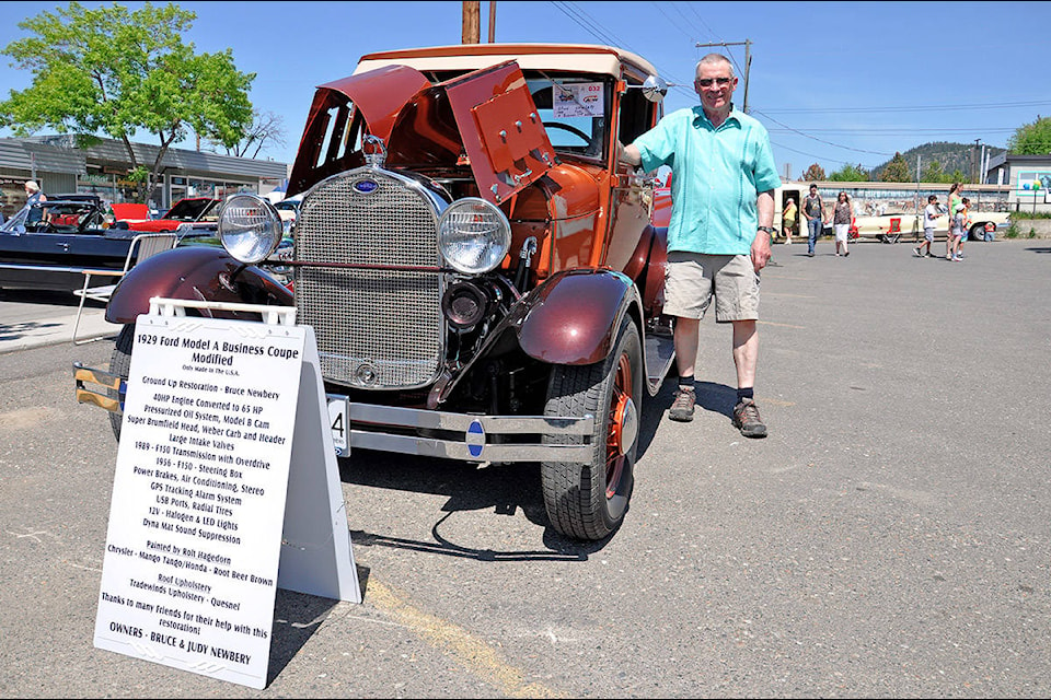 Bruce Newberry shows off his 1929 Model A4 Business Coupe, recently refinished, at the Lakers Car Club Show and Shine Sunday.