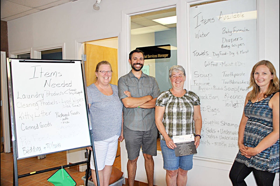 The fire relief donation centre set up in the old Lake City Ford building on Oliver Street will be accepting donations for another week or so, but may also be extended as the need arises. Key leaders of the operation are Veronica Zwiers (from the left) the warehouse manager, Zac Pinette the project co-ordinator, Glenda Winger the inventory controller, and Meg Fehr the communications officer. Gaeil Farrar photo