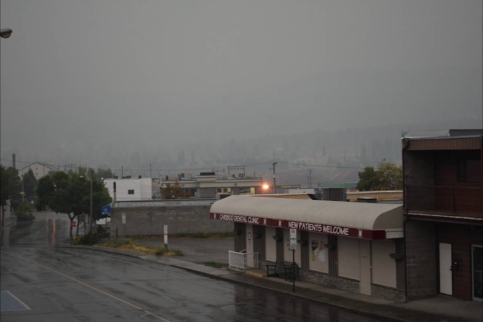 The scene in Williams Lake Sunday at 1:30 p.m. as rain continues to fall with some thunder heard through the heavy clouds and smoke. Cariboo Fire Centre information officer Natasha Broznitsky said lightning overnight did spark some new fire activity while the rain has quieted some areas. Monica Lamb-Yorski photo.