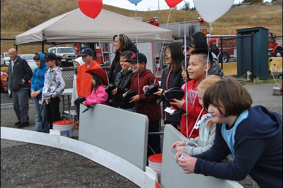 The remote control car track set up by the Cariboo Chilcotin Child Development Centre proved a popular event at the Stampede Association’s Wildfire Relief fundraiser Saturday at the Stampede Grounds. Funds raised will go toward helping non-profit community service organizations that have lost fundraising opportunities due to the wildfires. Gaeil Farrar photo