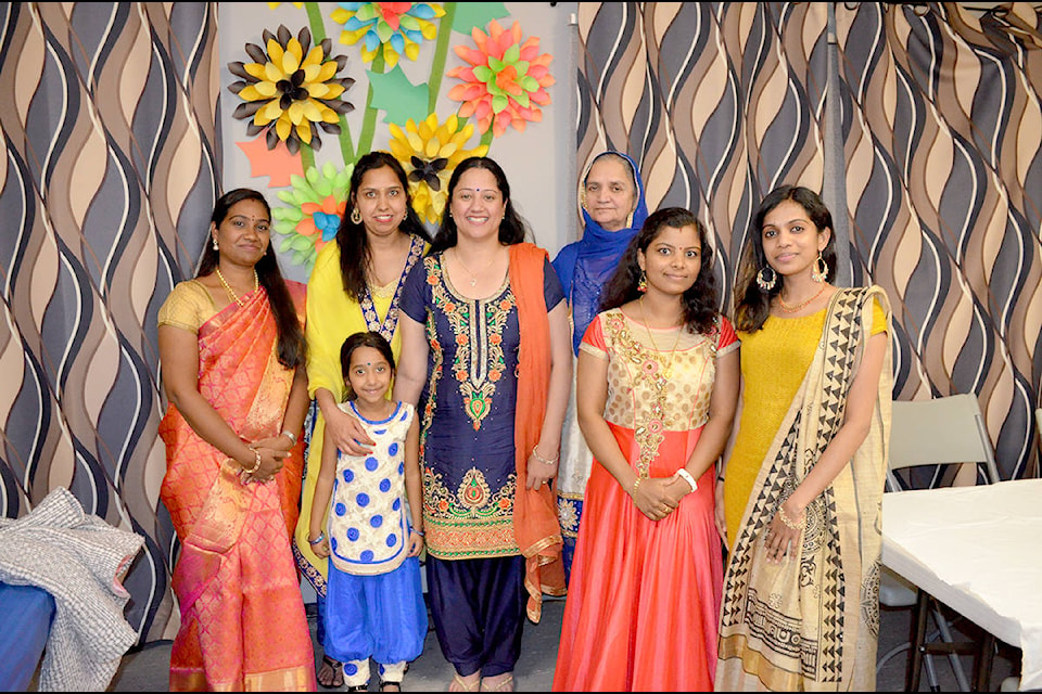 Dr. Babitha Sandeys (left), Gurminder Mangat, Keerti Mangat (in front), Parminder Nijjar, Rajinder Kaur, Jyothisha Rajesh and Sunisha Rakesh celebrated Diwali in style.
