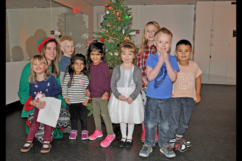 Instructor Annie Glanville led young, enthusiastic participants in a Christmas dance party with lights, treats, games and a Christmas ornament-decorating craft. (Greg Sabatino photos)