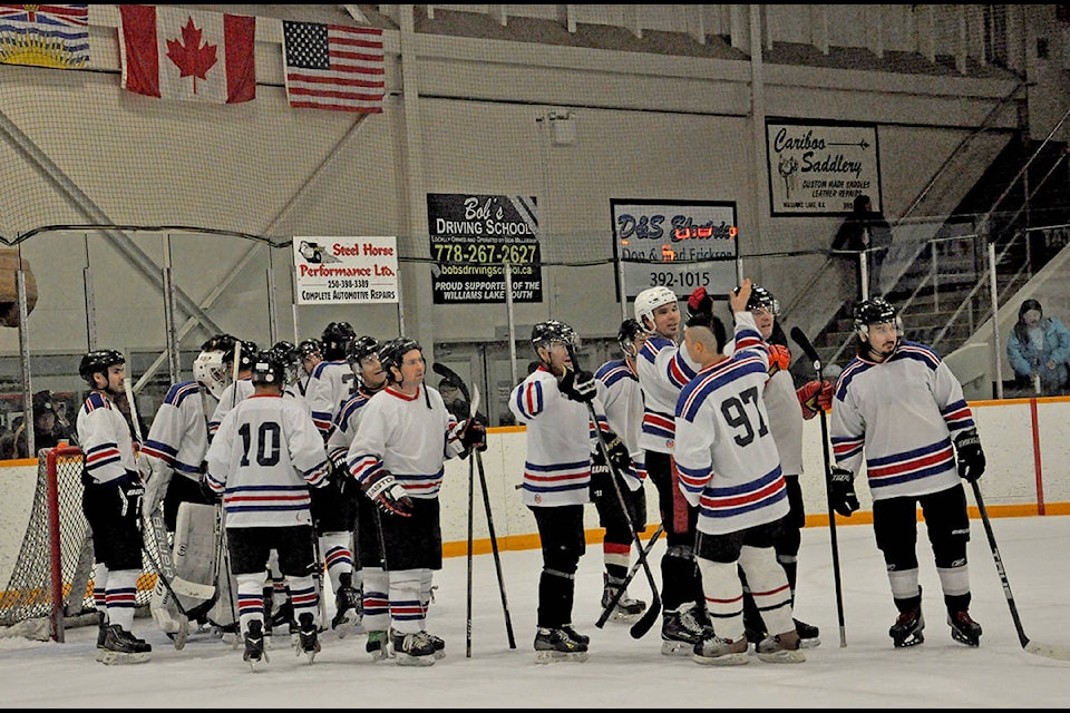 The Sugar Cane Hurricanes celebrate a win in the competitive division at the Cariboo Canucks First Nations Hockey Tournament. (Greg Sabatino photos)