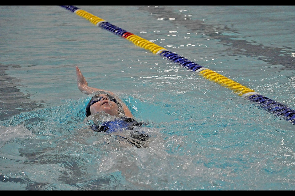 Greg Sabatino photos Peyton Bailey swims the 200-metre backstroke Sunday morning at the Sam Ketcham Memorial Pool.