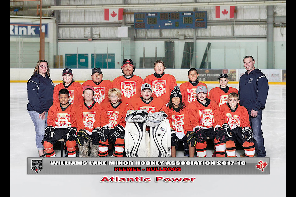 Peewee Bulldogs: Assistant coach Krista Harvey, (back row from left) Jordan Betts, Jalil Myers, Isidore Kalelest, Kaleb Bremner, Ethen Wycotte and Tristen Ritchot. Aidan Wycotte (front row from left), Riley Charleyboy, Timu Kruus, Ethan Moore, Kobe Robbins Johnson, David Hill, Boston Levens, head coach Justin Ritchot. Missing from photo: Michael Harvey, Will Roberts, Marc Nichols and Sarah Moore (manager).