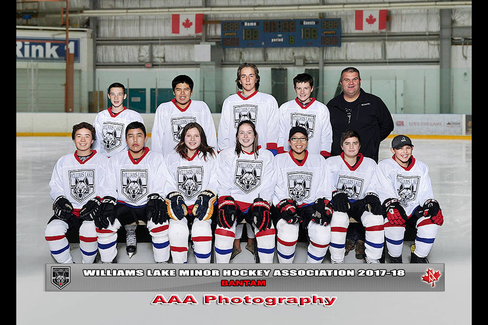 Bantam White: Owen Sim (back row from left), Damian Harry, Ty Robertson, Gavin McKimm and head coach Corwin Smid. Riley Derose (front row from left), Brennen William, Katelynn Hill, Marissa Ramsay, Keon Harry, Ethan Smid and Tyrone Nahbexie Stump. Missing from photo: Lochen Virk, Cortland Forster, Isaiah Smith, assistant coaches Trevor Smith and Taylor Callens, safety person Jeremy Forster, manager Shana Robertson and on-ice volunteers Brayden Smid and Carter Robertson.