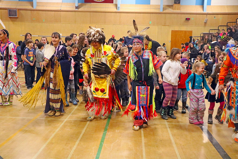 Dancers and Columneetza students combine in a inter-tribal dance at the Thomas Dueck Powwow held last Friday from 9 a.m to 3 p.m. It was the first full-day powwow the school has hosted for both its students and the community.