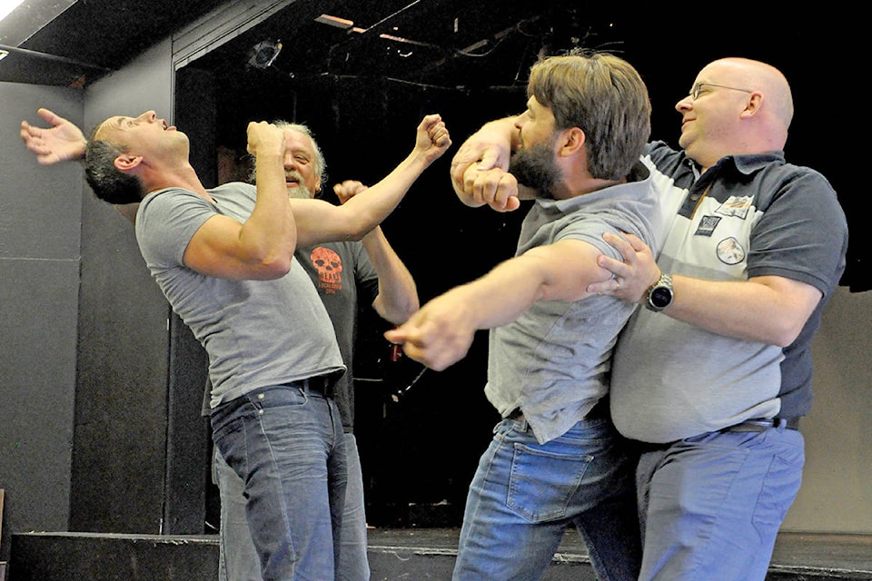 Neal Matoga (from left) takes part in a game of Puppets along with Sean Bredo, Max Winkelman and Martijn Schriever at the Williams Lake Studio Theatre’s Improv Workshop on Sunday, August 11. Greg Sabatino photo.