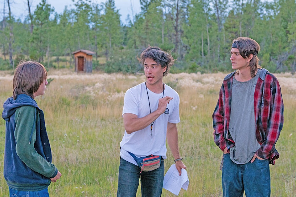 William Lulua (from left) listens as he receives direction Trevor Mack along with co-star Asivak Koostachin. Photo submitted.