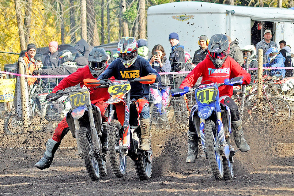 Marcus Deausy (right) flies out of the starting gate looking to overtake Julien Benek of Mission (from left) and Zach Ufimzeff of Lake Country in the open intermediate class Sunday during the Future West Motocross BC Championship Series Finale in Williams Lake. (Greg Sabatino photo)