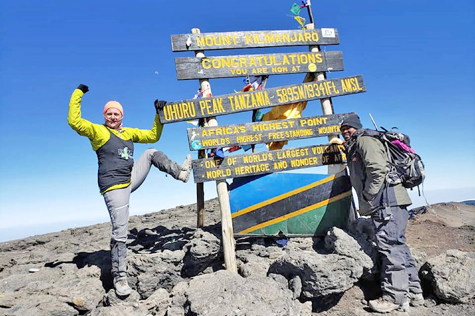 Williams Lake’s Sheila Gruenwald triumphantly poses at the summit of Mount Kilimanjaro — Africa’s highest point — after making an eight-day trek up the mountain capped off by reaching its peak on her 50th birthday. (Photos submitted)