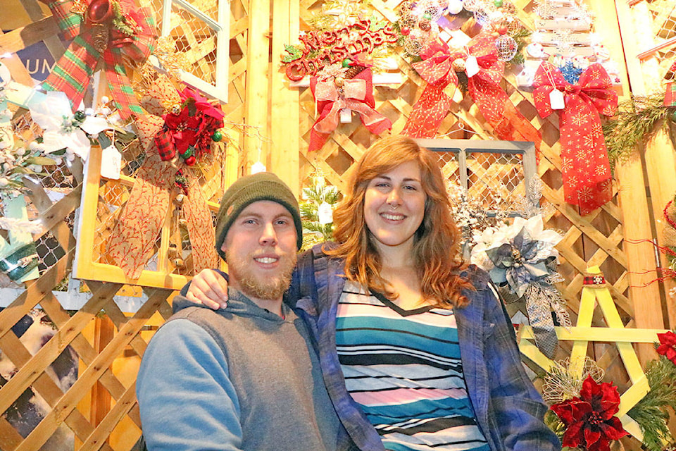 The Made in the Cariboo Craft Fair attracted all sorts of people, including Aaron Bracewell and his girlfriend Randi Bueckert who watched his mother Connie Bracewell’s booth for her for a bit on Saturday. Patrick Davies photo.